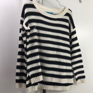 Buttons (Francesca’s)  black and white sweater